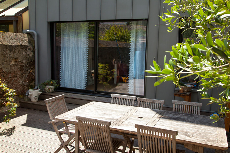Baie vitrée coulissante mixte aluminium / PVC - Menuiserie Bouvet Baie vitrée coulissante mixte aluminium / PVC - Menuiserie Bouvet